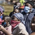 Residents of Snake Park in Soweto, a town in the city of Johannesburg, South Africa PHOTO: MARCO LONGARI / AFP